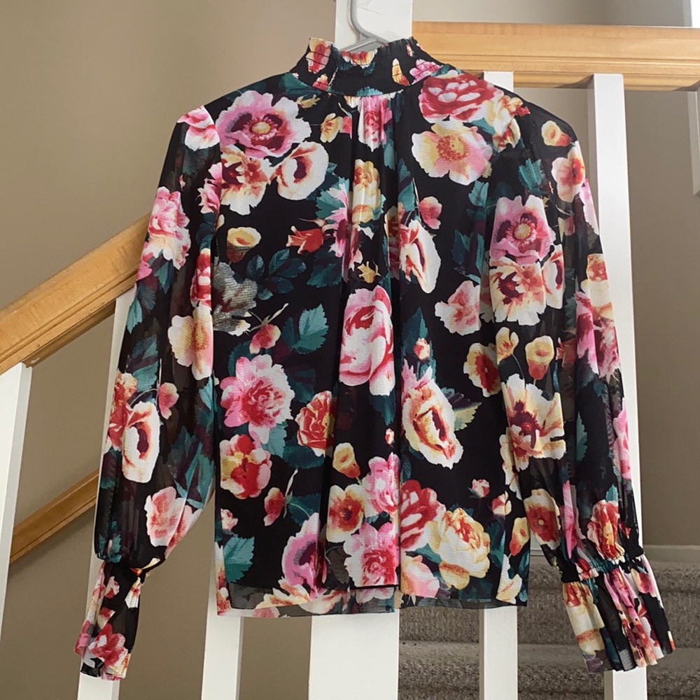 Long sleeve girls floral blouse.